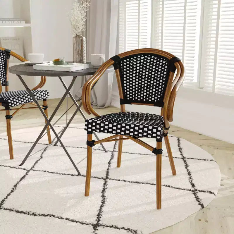 Emma & Oliver Soie Indoor/Outdoor Stacking Thonet Bistro Style Chair with Arms, PE Rattan Seat and Bamboo Finished Metal Frame
