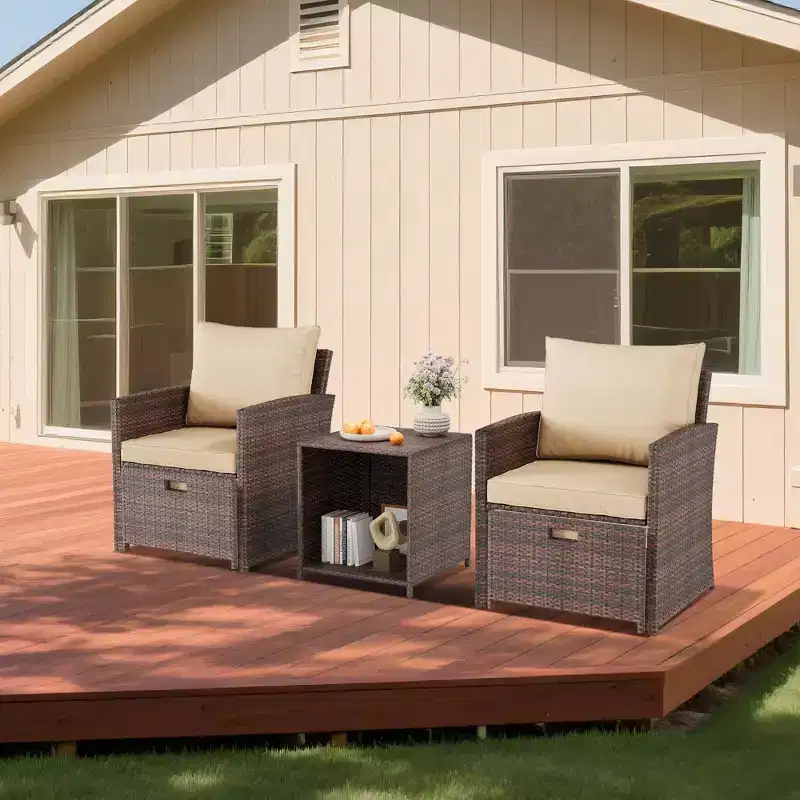 5-piece rattan outdoor patio furniture set includes plush cushions, two ottomans, and a double-decker coffee table.