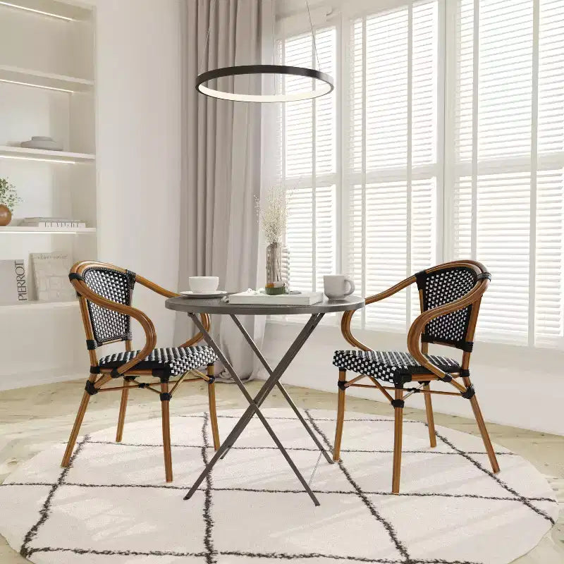 Emma & Oliver Soie Set of Two Indoor/Outdoor Stacking Thonet Bistro Style Chairs with Arms, PE Rattan Seat and Bamboo Finished Metal Frame